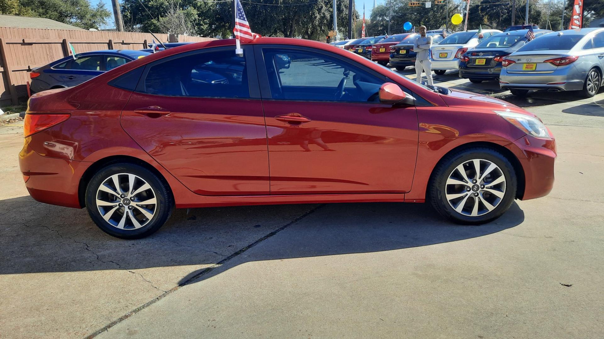 2017 Hyundai Accent (KMHCT4AE9HU) , located at 16710 Clay Rd., Houston, TX, 77084, (281) 859-7900, 29.834864, -95.656166 - Photo#1